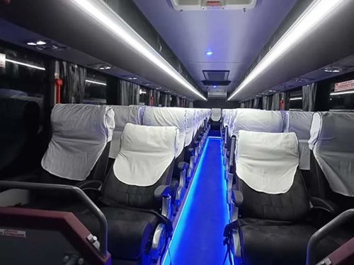 AC bus rental for group travel in Kerala